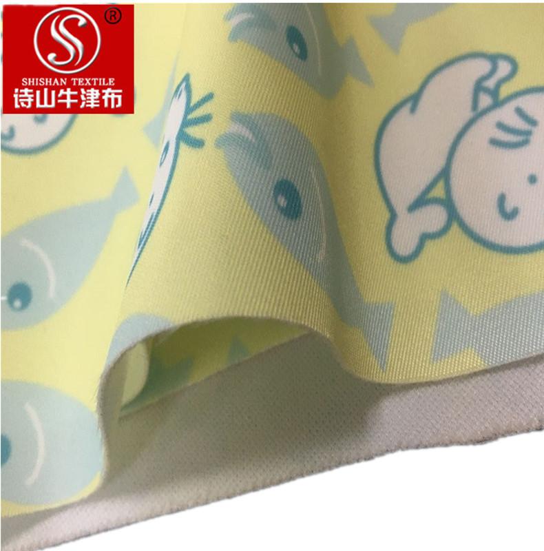 厂家现货供应230斜纹复合牛津布箱包手袋布家居户外用品面料白底实物图