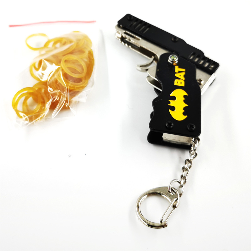 Small rubber band gun, metal toy gun, alloy pistol model, zinc alloy craft hanging accessory Application Scenario