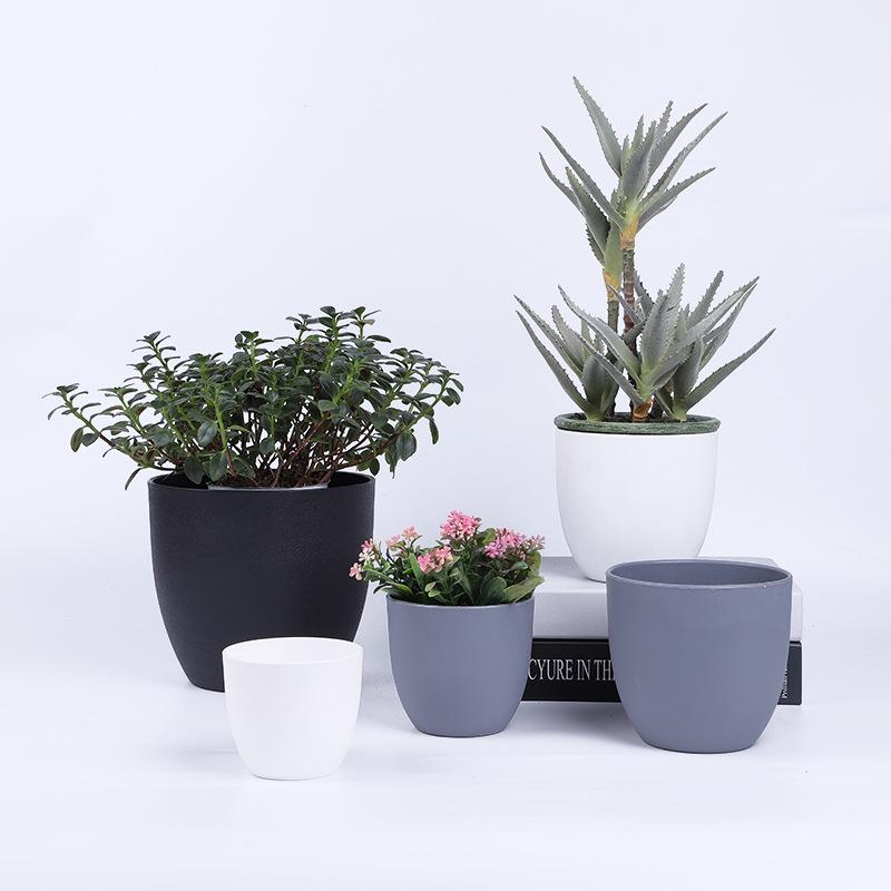 The manufacturer supplies simple succulent artificial flower arrangements, round flower POTS and imitation porcelain flower POTS Item Picture