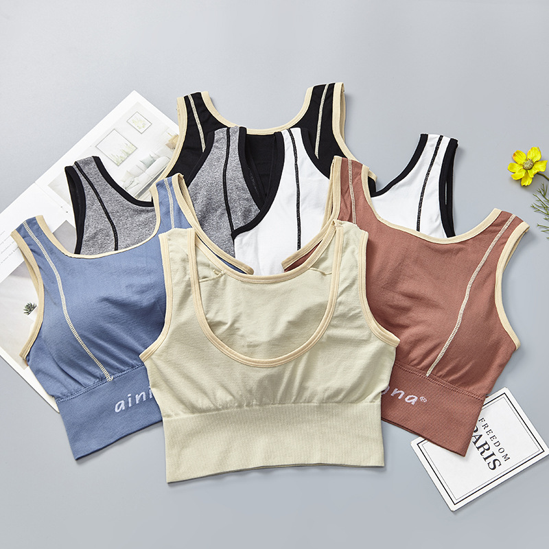 New English letter contrasting color long version thickened, with a beautiful chest, back wrap, seamless chest, tapering abdomen, wide shoulder straps, and outerwear underwear for women details Picture