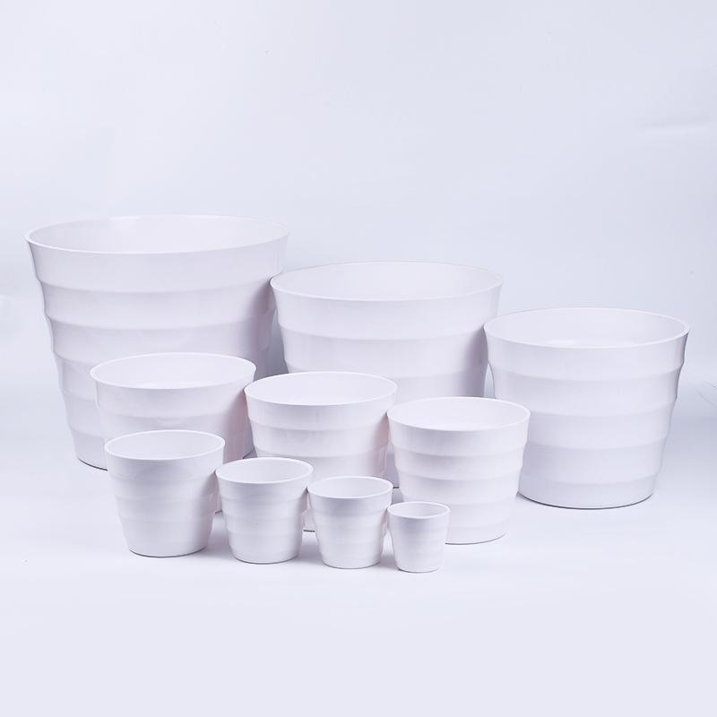 The coarse-textured Y02 series 10-sized faux porcelain plastic flowerpot is made of melamine material, with a solid color scheme and simple design
