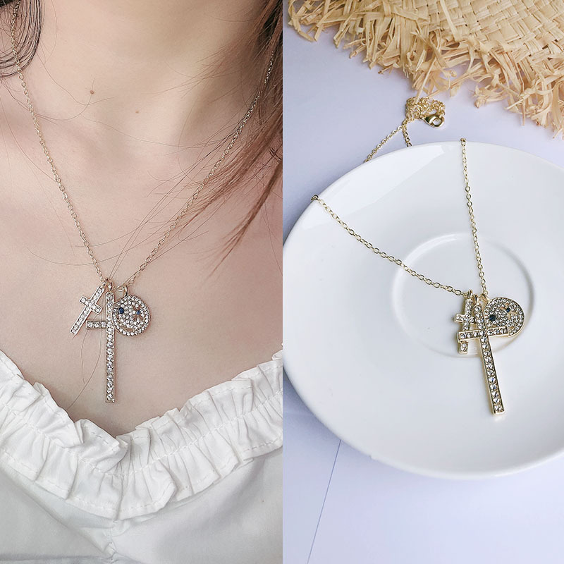 时尚酷女冷淡风INS欧美笑脸十字架钩子ins风潮人个性多层秋冬毛衣细节图