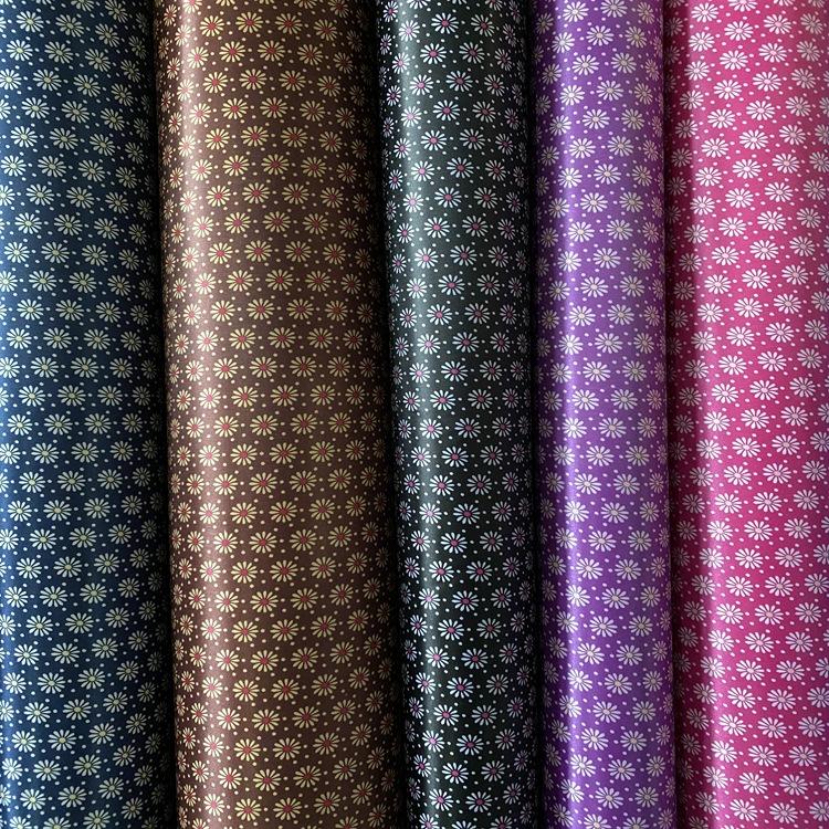 Color serie de impresión de dinkin fondo de poliéster tejido de espuma material de equipaje venta directa de fábrica de una pieza en orden