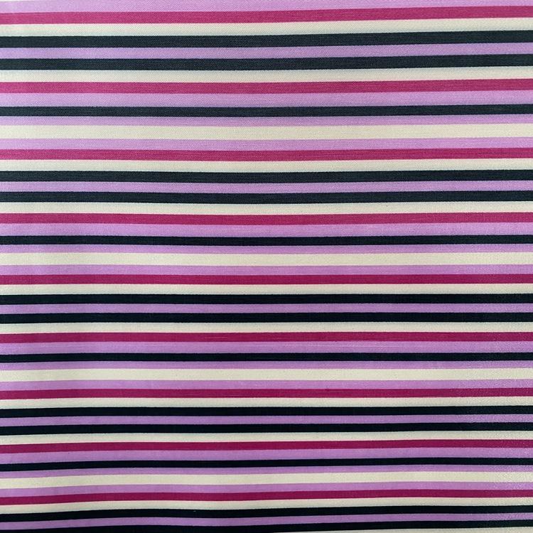 Yiwu Dada color-printed polyester printed bottom PVC foam cosmetic bag and bag windproof quilt fabric Application Scenario