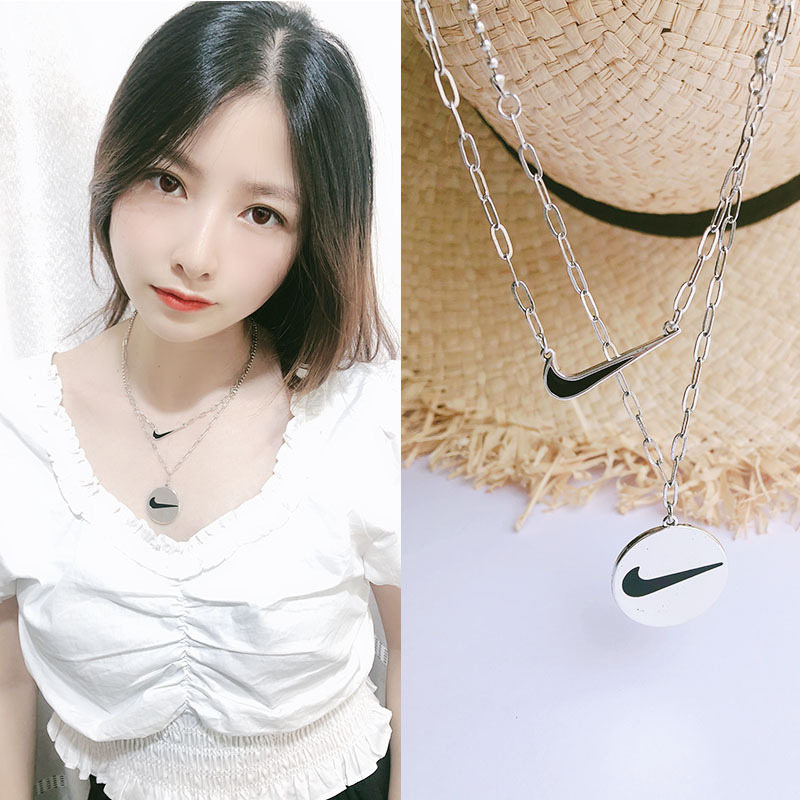 时尚酷女冷淡风INS欧美笑脸十字架钩子ins风潮人个性多层秋冬毛衣产品图