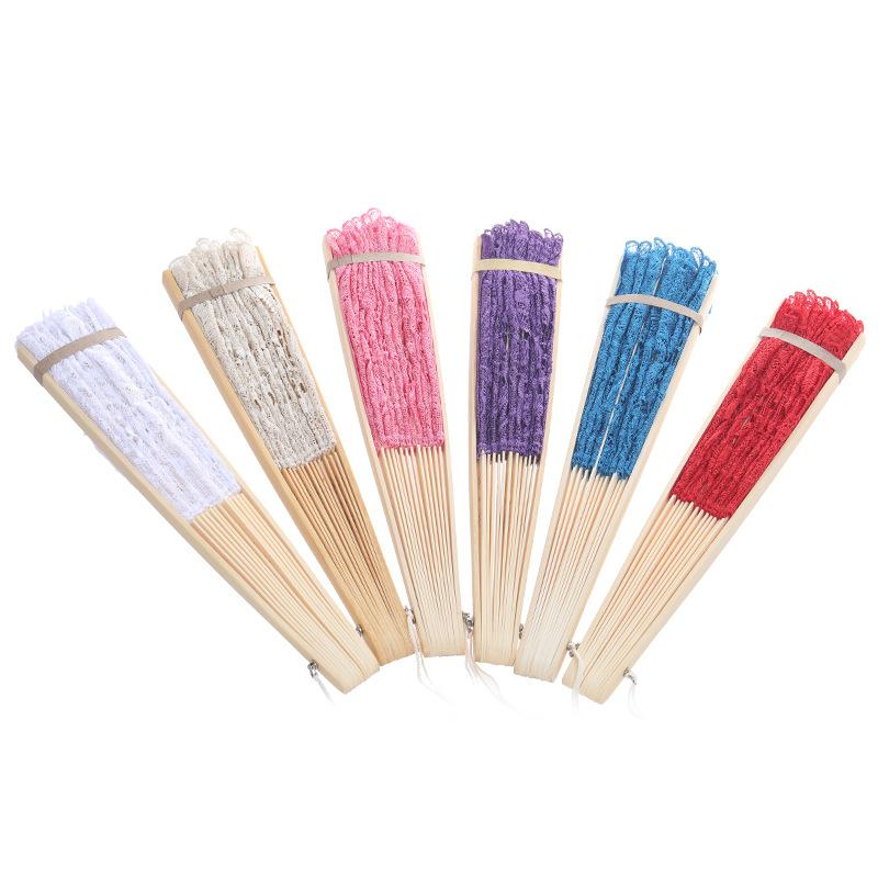 Creative new lace fans, white cotton fabric hollowed-out folding fans, performance fans, decorative fans, wedding supplies wholesale Application Scenario