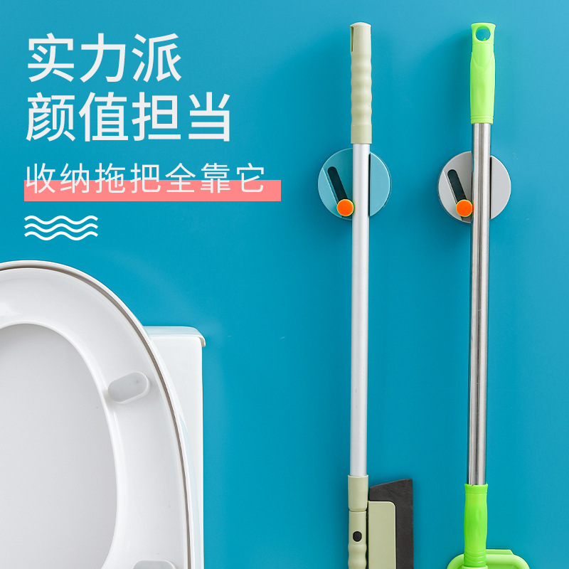 Factory direct sales of seamless and powerful mop rack, new type of non-drilling slider mop rack, durable and creative mop clamp full figure