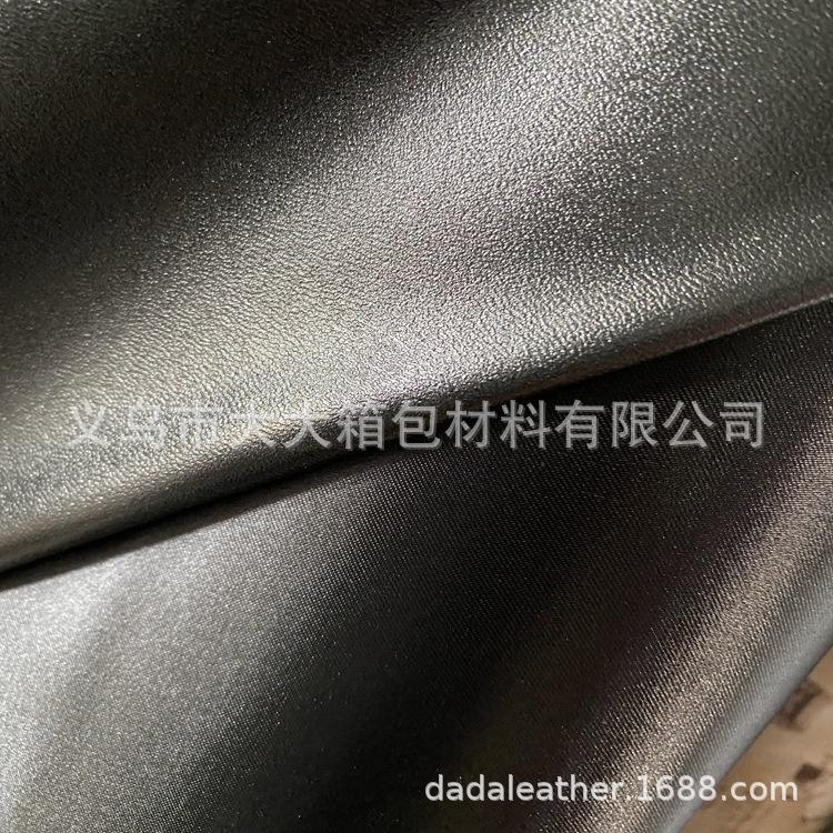 Yiwu Dada Factory Direct sales of lustrous leather single-color butyl foam five-beauty satin bottom foam bag fabric details Picture