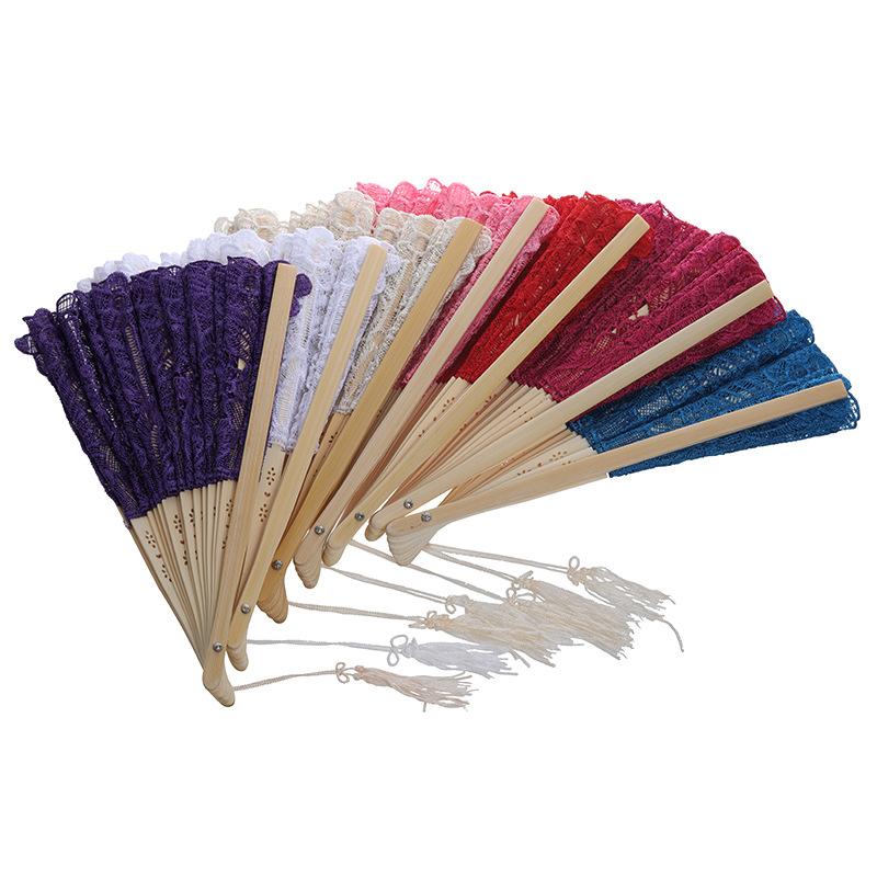 Creative new lace fans, white cotton fabric hollowed-out folding fans, performance fans, decorative fans, wedding supplies wholesale Specification image