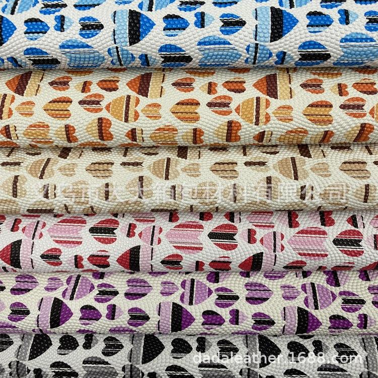Yiwu big manufacturers direct pearl pattern heart-shaped leather spunky bottom artificial leather luggage fabric thumbnail