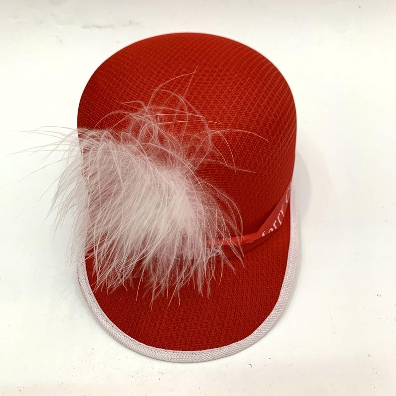 Dome-shaped African child's red "Happy New Year" baseball cap and white feather "Happy Christmas and New Year" little boy hat details Picture
