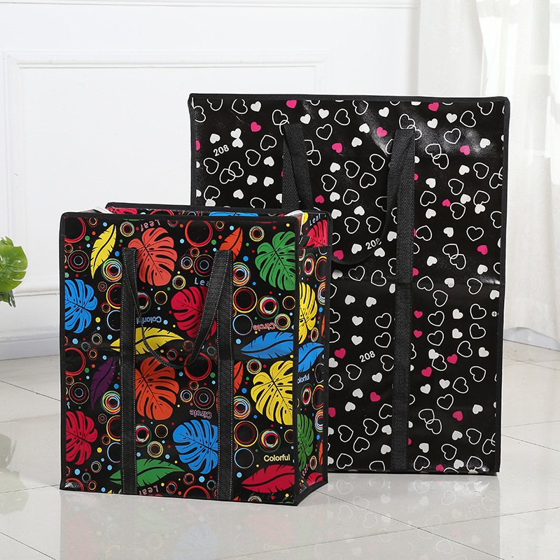 The new composite non-woven bag creative love full spread cotton quilt moisture-proof finishing bag going out to move packing bag customization thumbnail