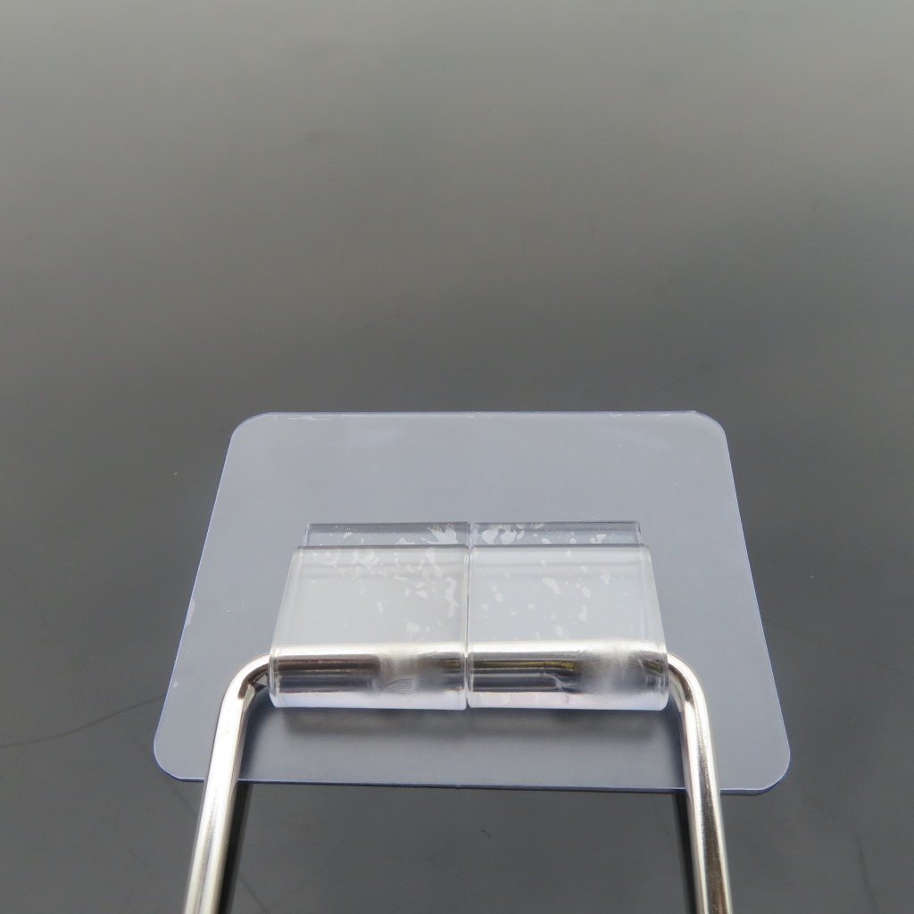Seamless solid claw-buckle stainless steel storage rack, strong nail-free U-shaped card button universal patch ironwork hanging rack Item Picture