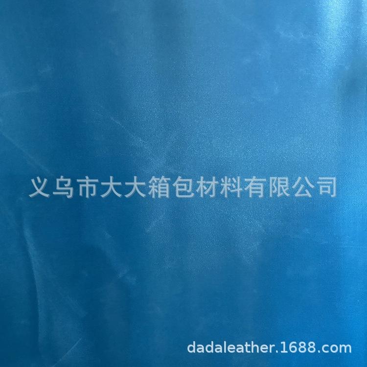 Yiwu Dada Factory Direct sales of lustrous leather single-color butyl foam five-beauty satin bottom foam bag fabric Specification image