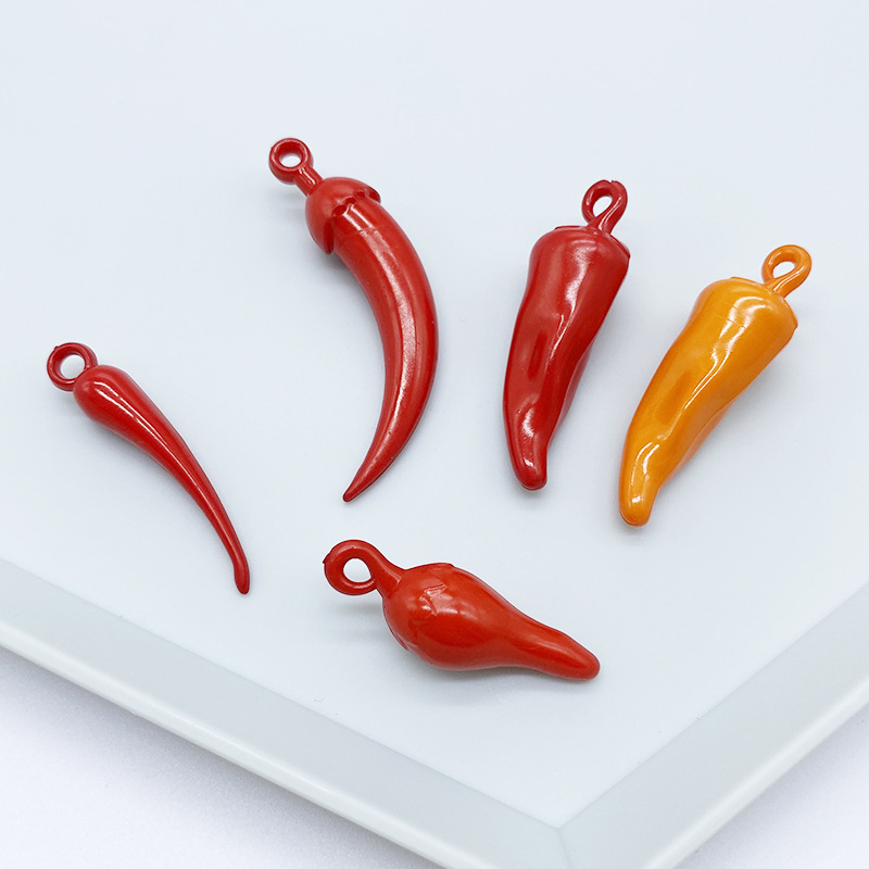 This is a diy beaded material of the same style as the popular acrylic hanging hole small chili pepper hundred-piece. The red color is used to make earrings details Picture