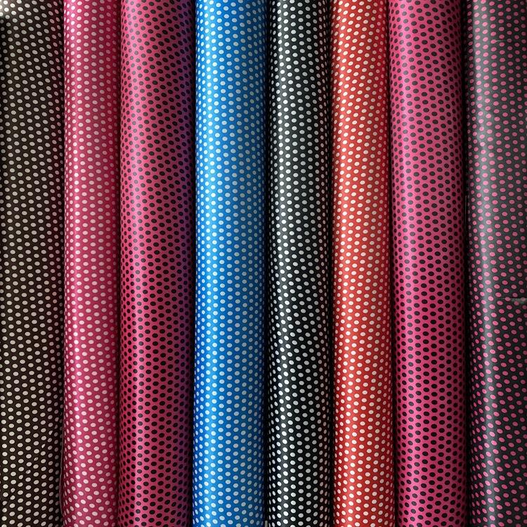 大大箱包 工厂直售 涤纶色丁印花布 PVC发泡底部 箱包化妆包面料