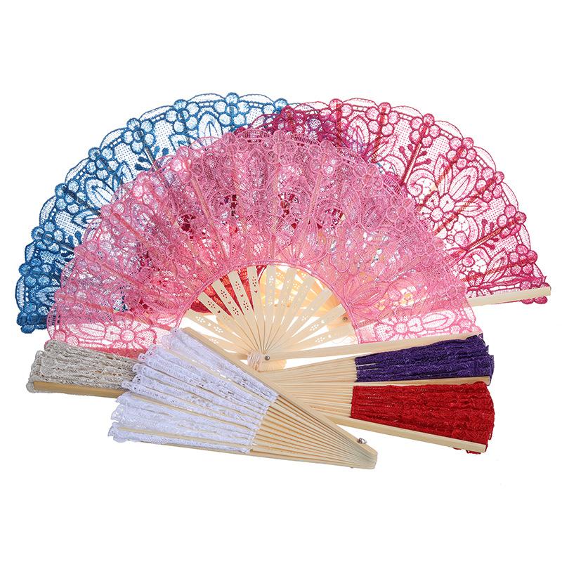 Creative new lace fans, white cotton fabric hollowed-out folding fans, performance fans, decorative fans, wedding supplies wholesale