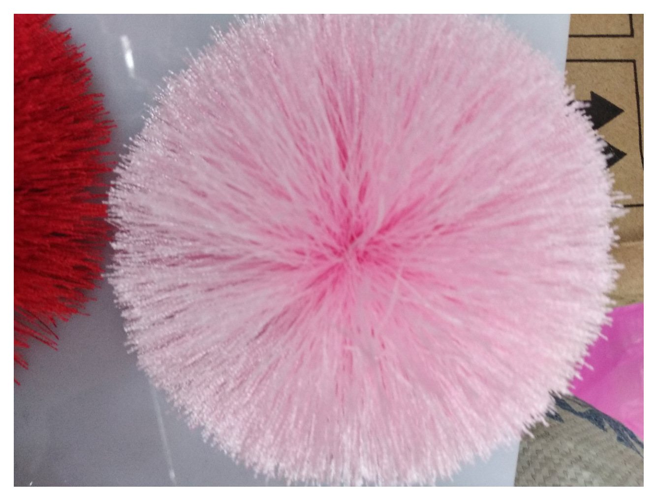 We supply cute hats, wool balls, polyester embroidered thread shoes, flower balls, tassels, decorative scarves and plush ball hangers Item Picture