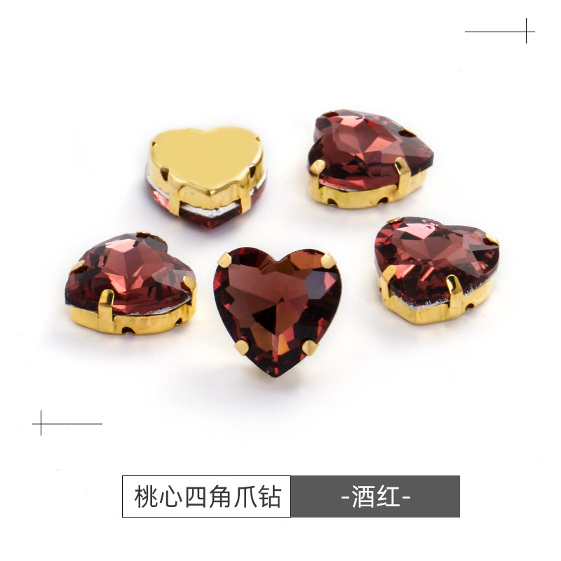Factory wholesale of heart-shaped hand-sewn gold bottom claw diamonds, DIY wedding dress accessories, hand-sewn diamonds with holes, glass diamonds undefined