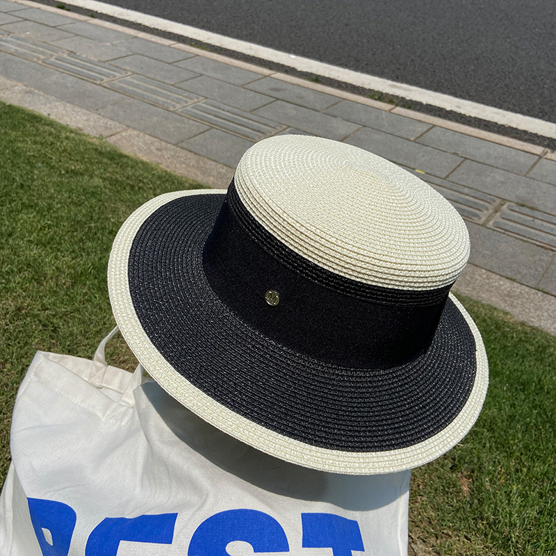 A popular flat-topped straw hat for women, a Korean-style trendy summer beach sun protection hat, a top hat, and an M-letter woven fisherman's hat undefined