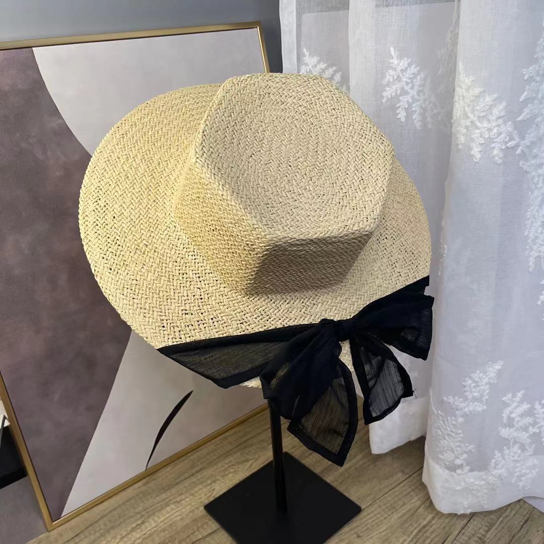 A female hat with a spring and summer ribbon, butterfly sash, hexagonal straw hat, Korean street style, anti-ultraviolet sun hat, and a wide-brimmed hat undefined