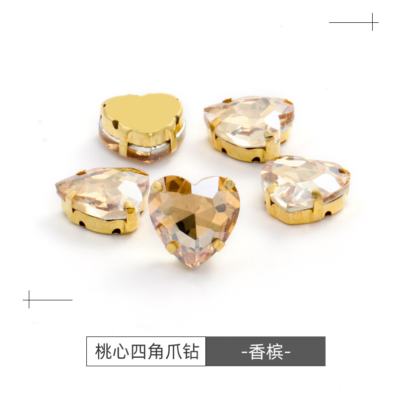 Factory wholesale of heart-shaped hand-sewn gold bottom claw diamonds, DIY wedding dress accessories, hand-sewn diamonds with holes, glass diamonds undefined