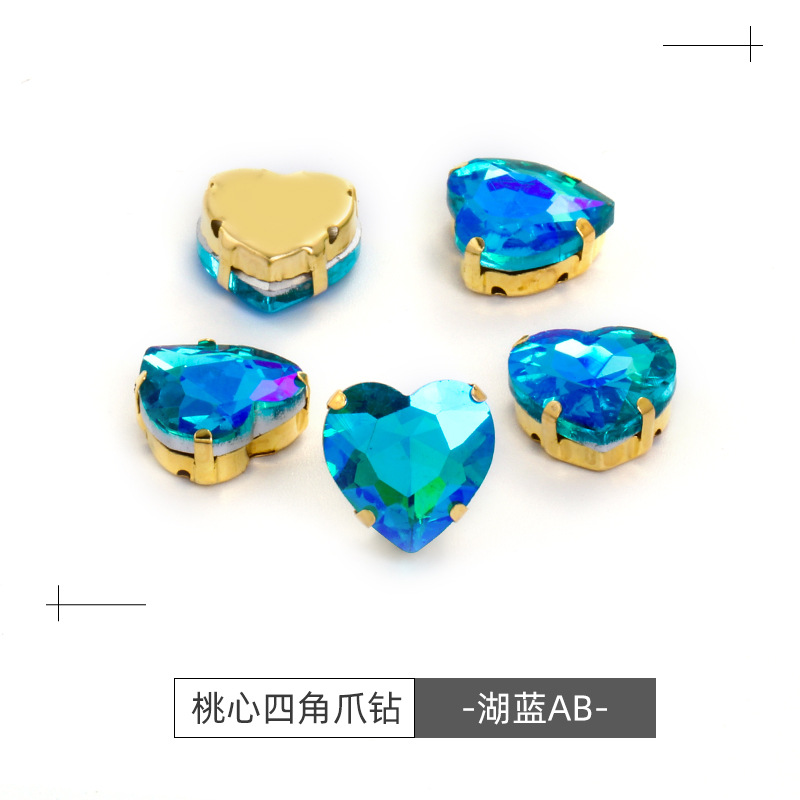 Factory wholesale of heart-shaped hand-sewn gold bottom claw diamonds, DIY wedding dress accessories, hand-sewn diamonds with holes, glass diamonds undefined