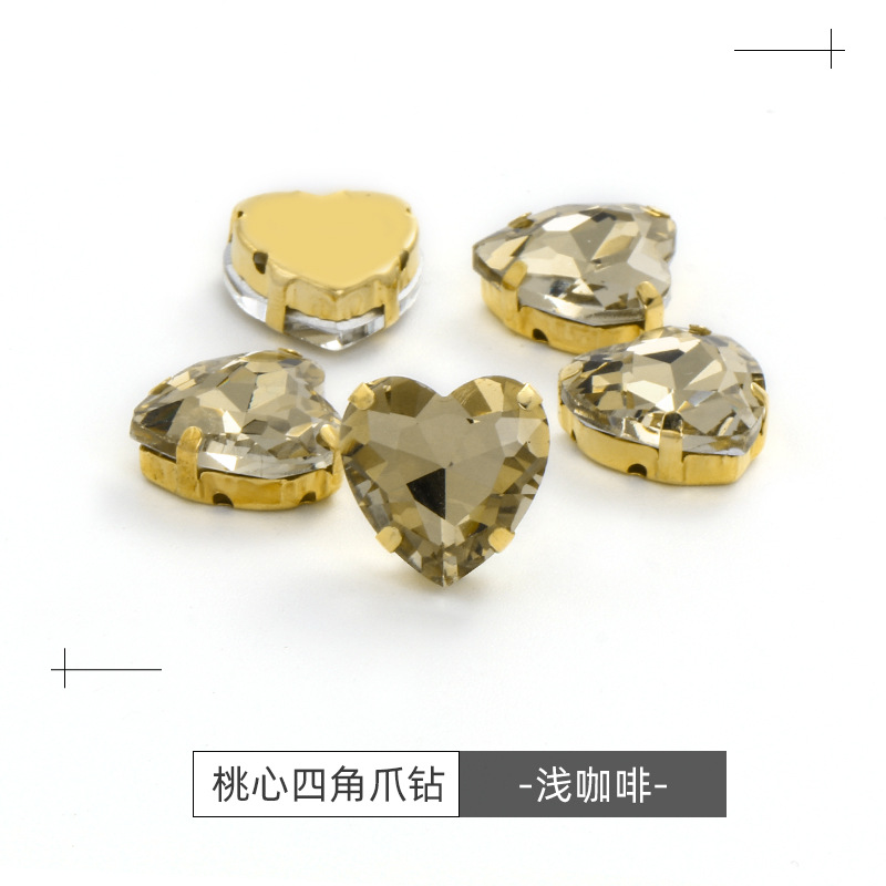 Factory wholesale of heart-shaped hand-sewn gold bottom claw diamonds, DIY wedding dress accessories, hand-sewn diamonds with holes, glass diamonds undefined