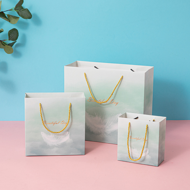 Ins-style handbags, clothing, cosmetics, shopping paper bags, tea packaging bags, birthday gift bags with logo printing