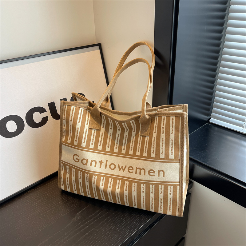 Canvas bag women's large capacity 2024 new spring all-match striped shoulder bag cloth bag class commuting Tote bag details Picture