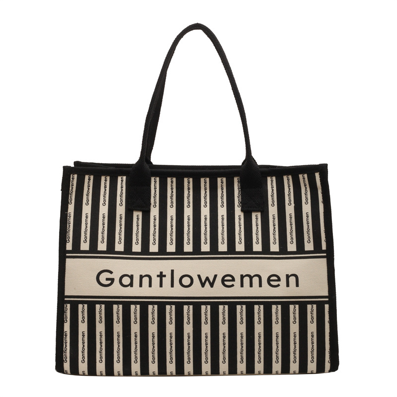 Canvas bag women's large capacity 2024 new spring all-match striped shoulder bag cloth bag class commuting Tote bag Item Picture