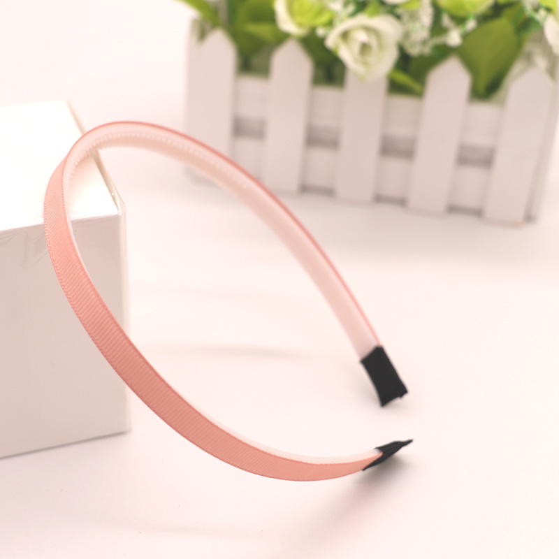 Factory direct sales of new 1CM candy-colored fashionable DIY hair band, Korean-style fabric with teeth, handcrafted plastic hair accessory Application Scenario