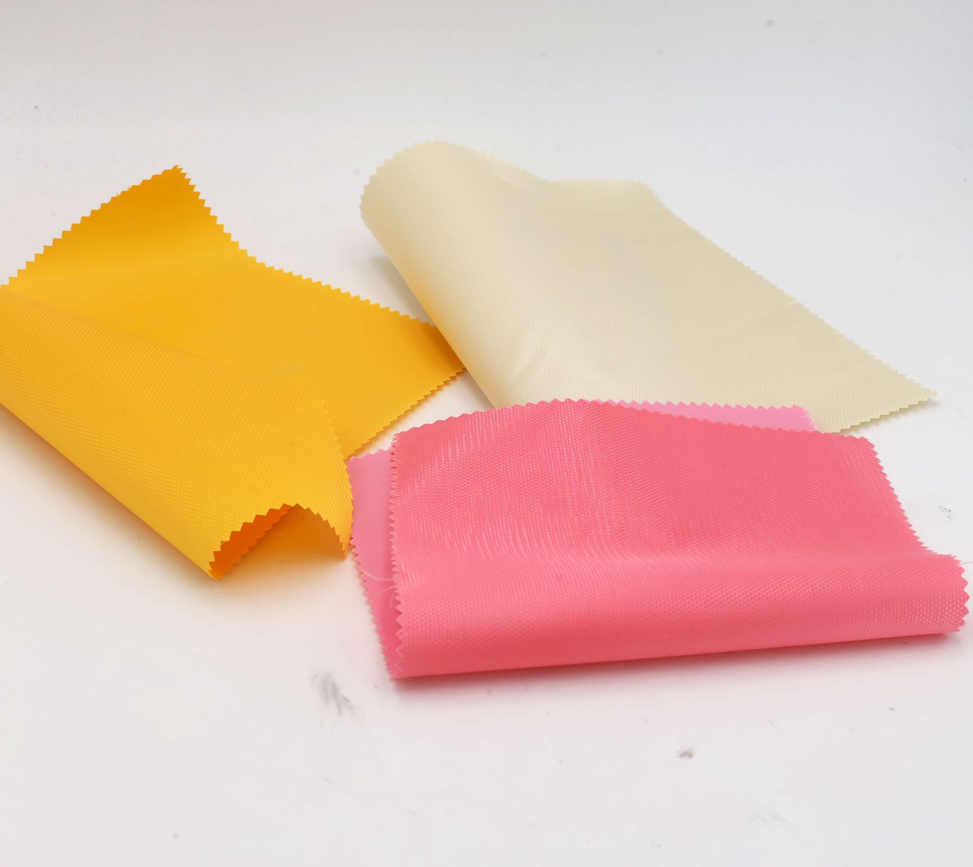 厂家直销 涤纶布料420D 十字提花 PVC 手袋箱包牛津布面料白底实物图