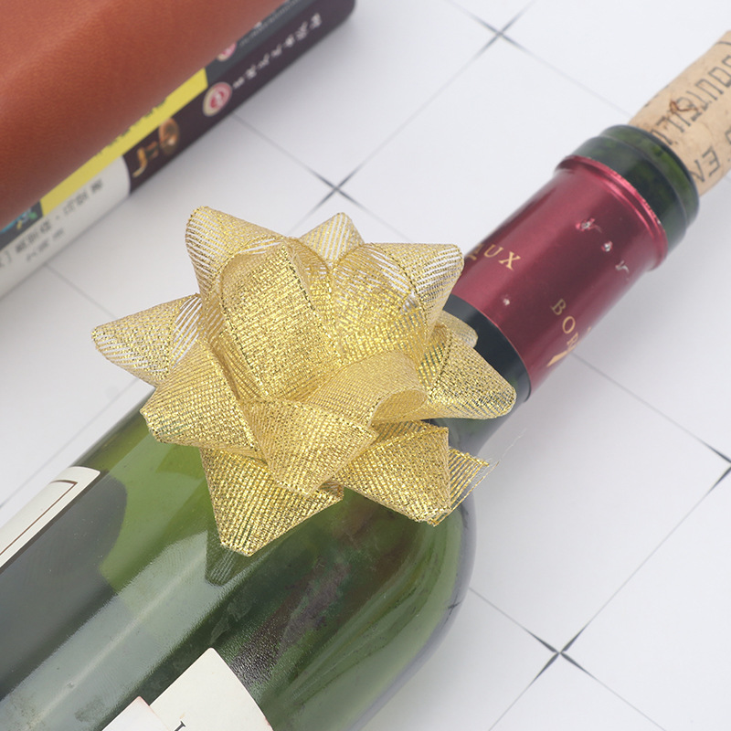 Wholesale High-Grade Gold Onion With Star Flower Christmas Polyester Silk With Star Flower Red Wine Bottle Gift Packaging Ribbon Flowers Application Scenario