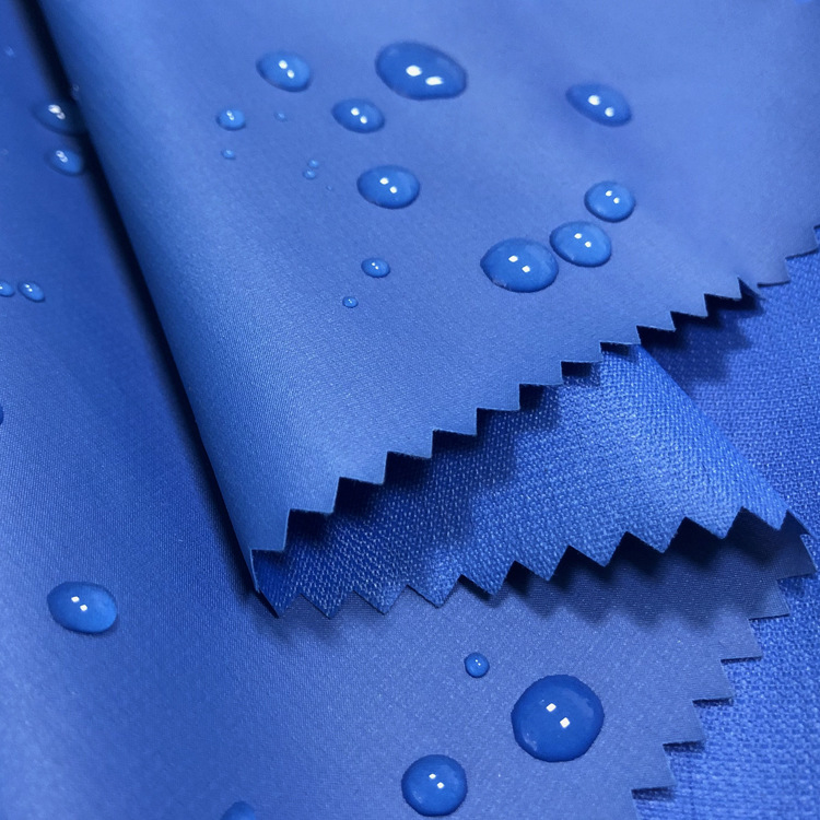 【现货】涤纶小蜂巢PVC涂层雨衣布料 防风防雨水户外冲锋衣面料图