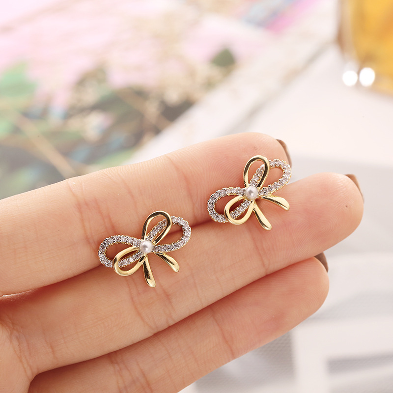 E6716 arco perla orejas micro zirconita venta caliente pendientes no regulares versión coreana estilo coreano incrustado piedras preciosas Application Scenario