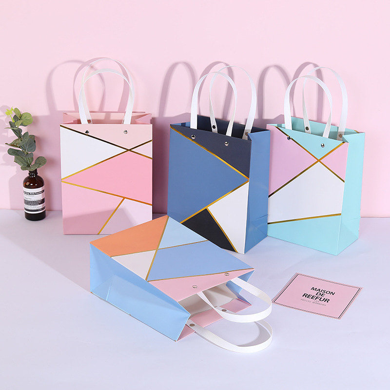 现货简约烫金礼品袋拼色几何白卡纸袋创意购物手提袋可印logo