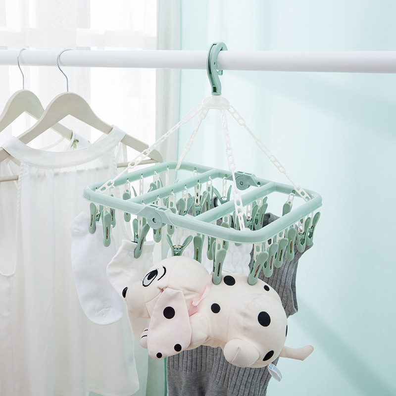 32-clip folding clothes rack, adult plastic multi-clip, children and baby sock rack, household sun-drying rack, windproof clothes drying rack Application Scenario