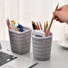 Creative and fashionable plastic hollowed-out desktop storage basket mini trash can basket for home sundries storage Application Scenario