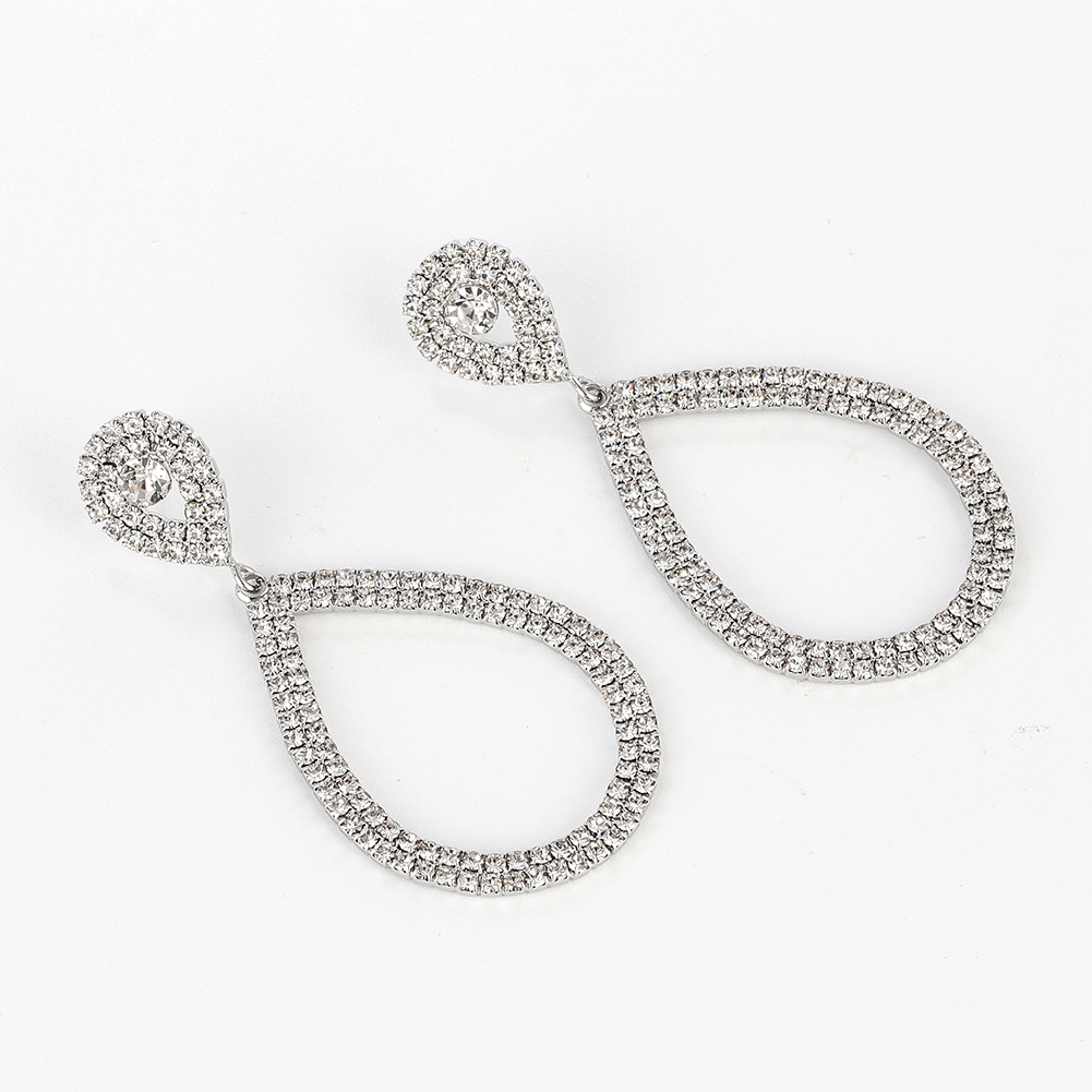 Non-returnable and non-exchangeable European and American hollowed-out teardrop-shaped large earrings, exaggerated diamond-encrusted geometric claw-shaped stud earrings earrings Specification image
