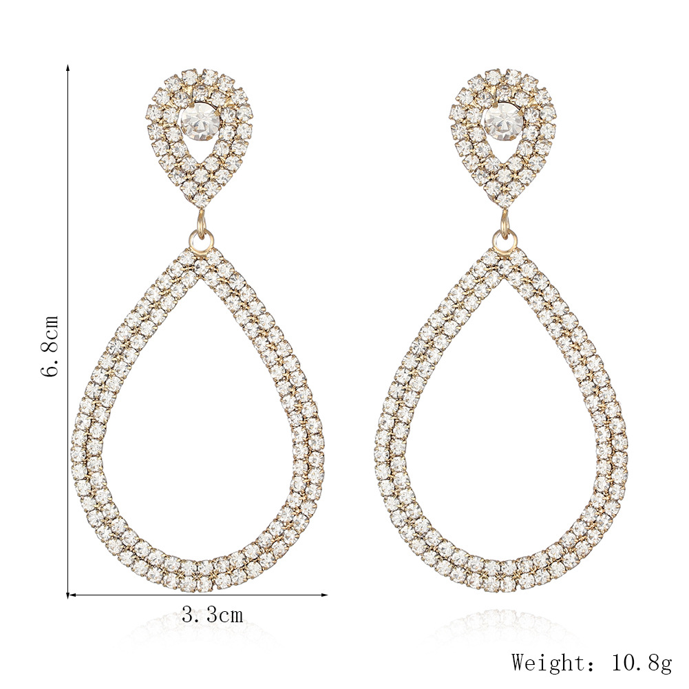 Non-returnable and non-exchangeable European and American hollowed-out teardrop-shaped large earrings, exaggerated diamond-encrusted geometric claw-shaped stud earrings earrings Item Picture