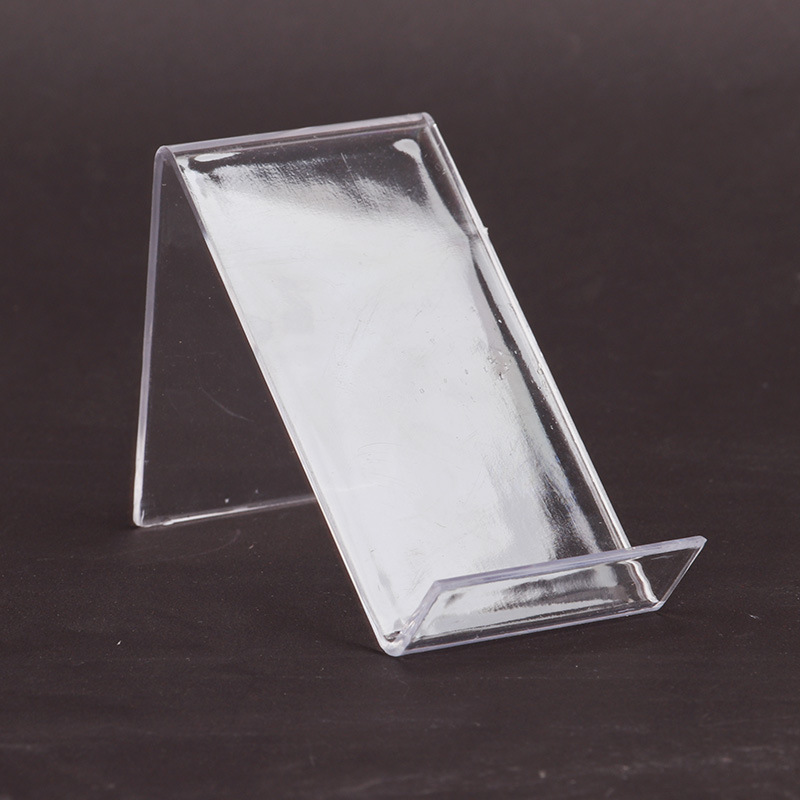 Mobile phone display stand, film cover stand, convenient night market street stall, available transparent plastic lazy person's desktop mobile phone stand in stock