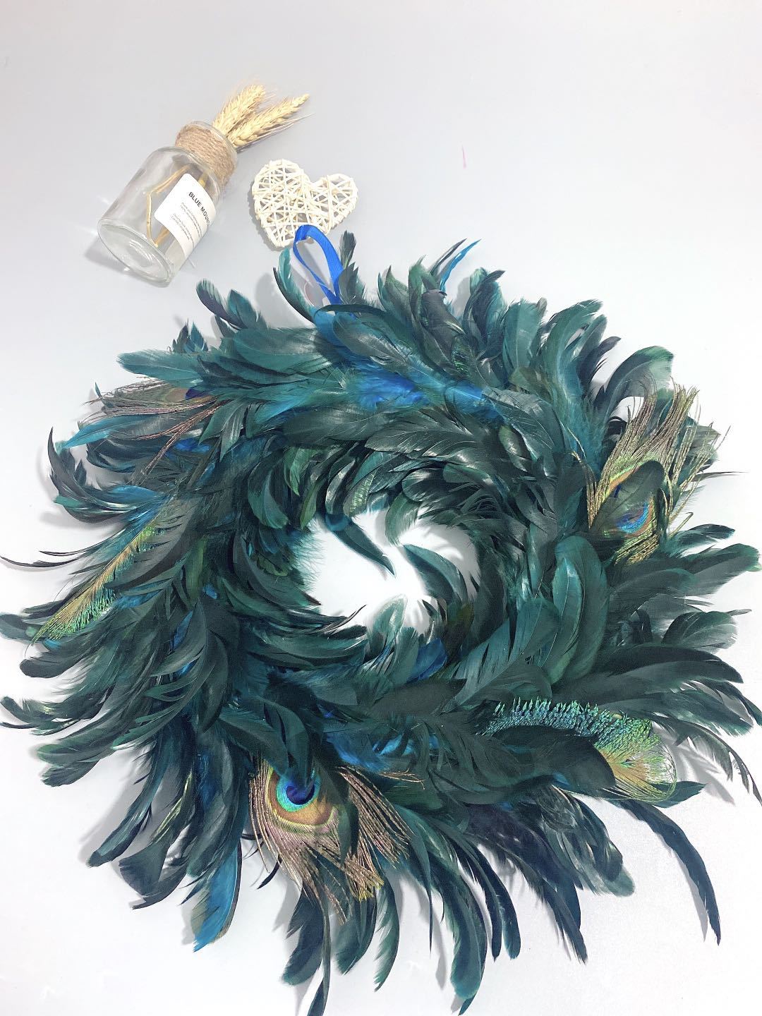 The manufacturer supplies Halloween black feather rings, festival decorations, garlands, front door hangers and black door hangers