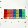 The seven-color portable sealed pill reminder storage box can be disassembled for 7 days a week with a transparent shell and 21 compartments details Picture