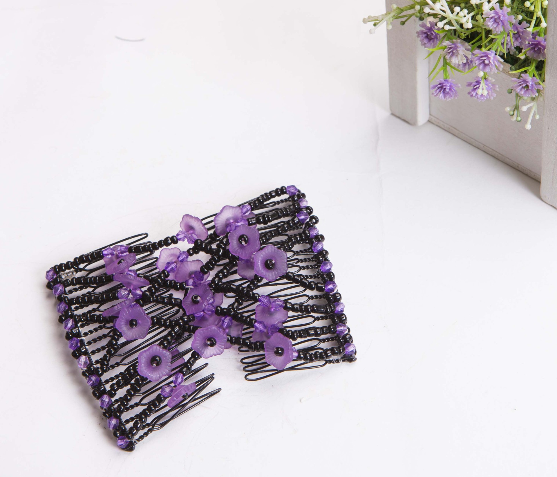 Direct supply from the manufacturer of the popular acrylic matte textured hair comb and hair coil in Europe and America, featuring fashionable horn patterns