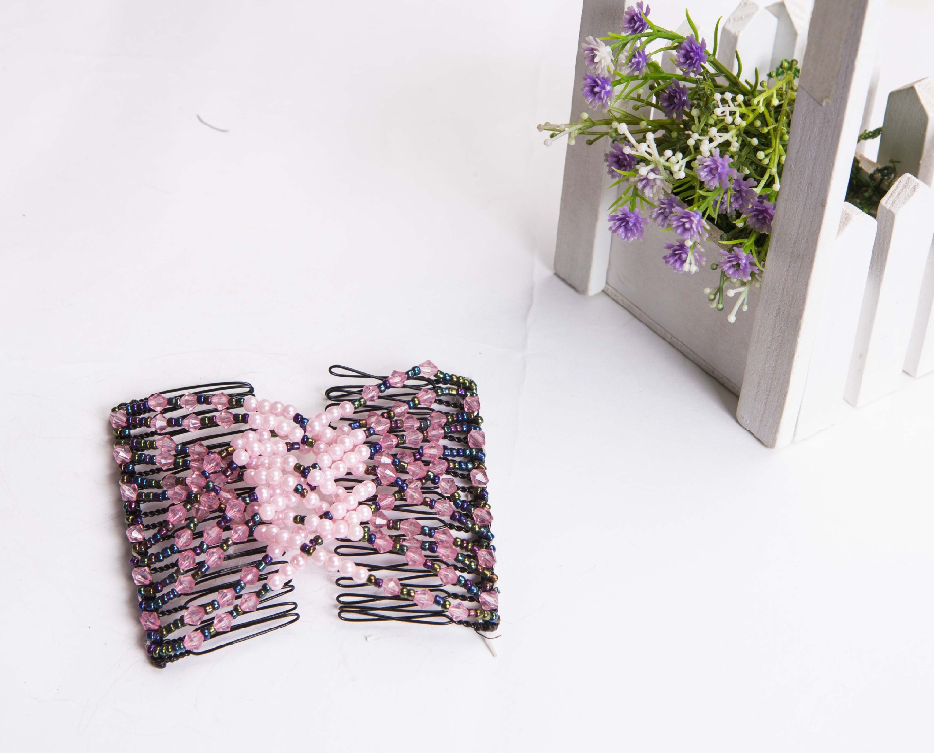 The 2020 European version ABS pearl acrylic coil bead 12-piece versatile hair comb and hair dresser is a bestseller on the Internet
