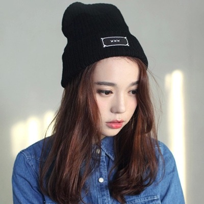 Korean version of the Spring and Autumn XXX letter stick cloth pure black European and American style flanged knitted hat pointed hat male and female couples street auction