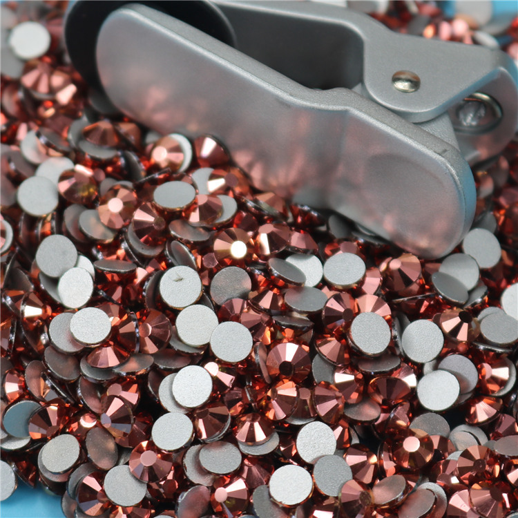 Metallic glossing nail drill detail display in close-up