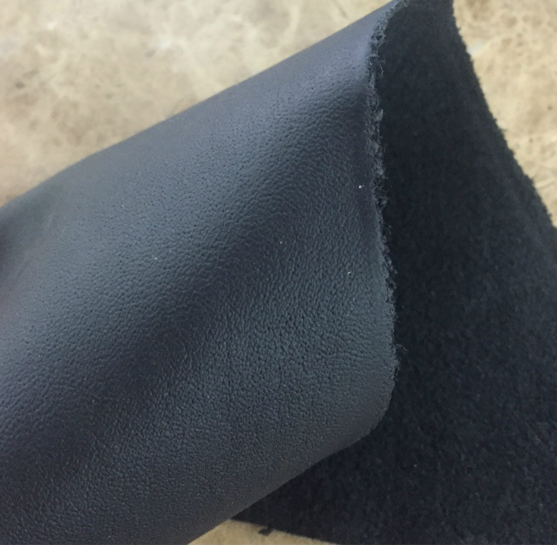Yiwu genuine black cowhide top layer cowhide, car leather black pinhole car steering wheel cover cowhide