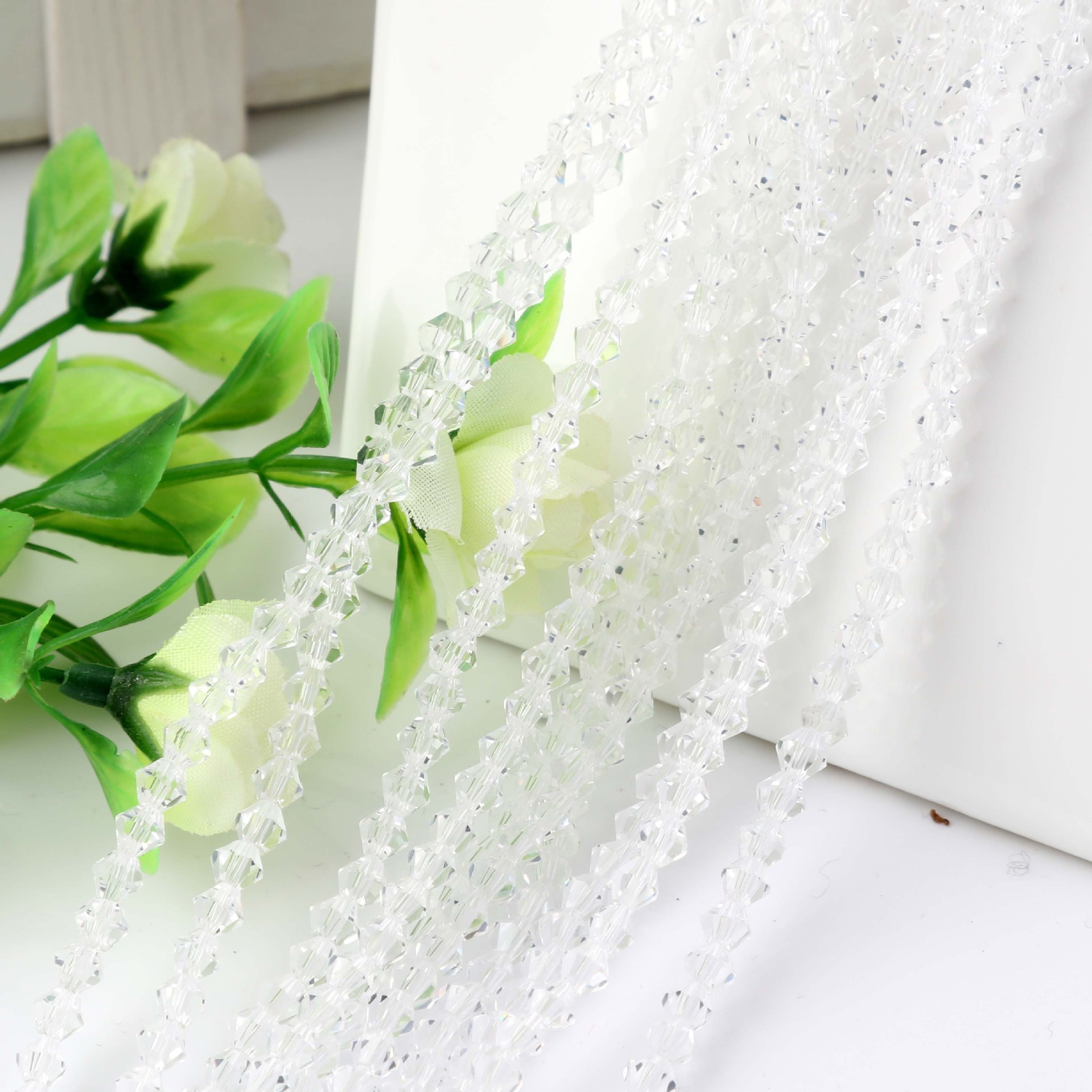Diamond-shaped crystal loose beads 4mm/6mm hollow two-pointed DIY handmade hair accessory material, decorative accessories Specification image